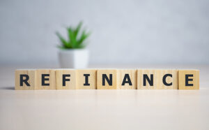 Focus On Wooden Blocks With Letters Making Refinance Text